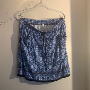 patterned blue skirt